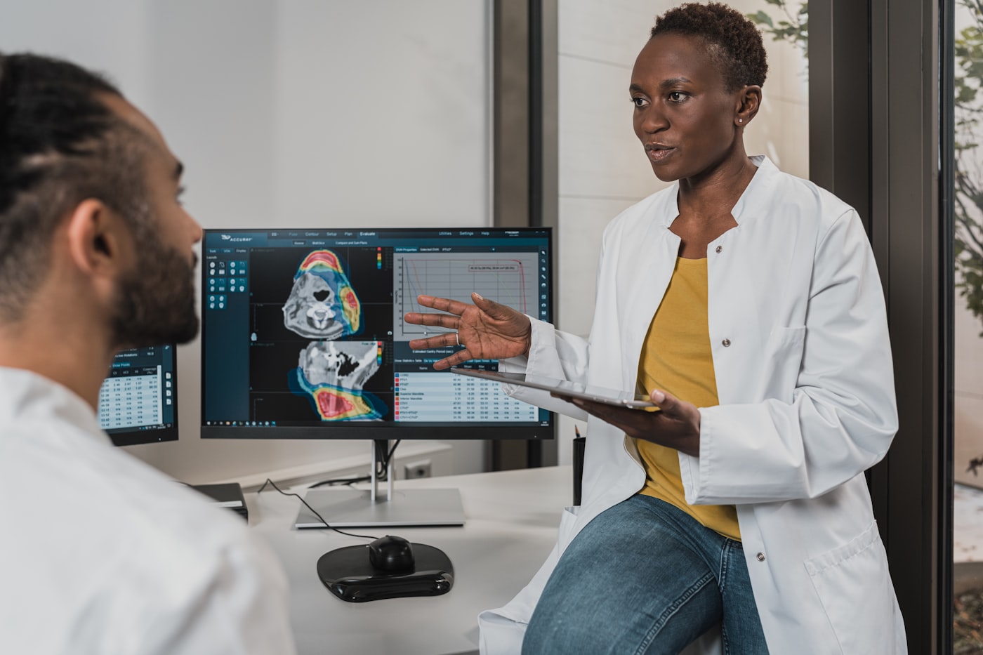 Clinicians reviewing imaging for institutional healthcare partners