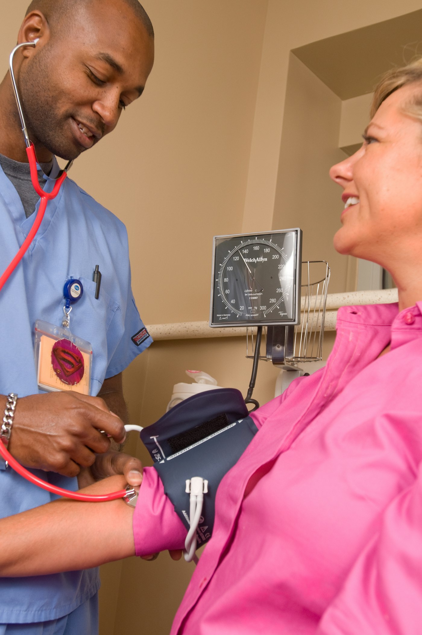 Clinician providing patient care supporting nephrology and renal treatment