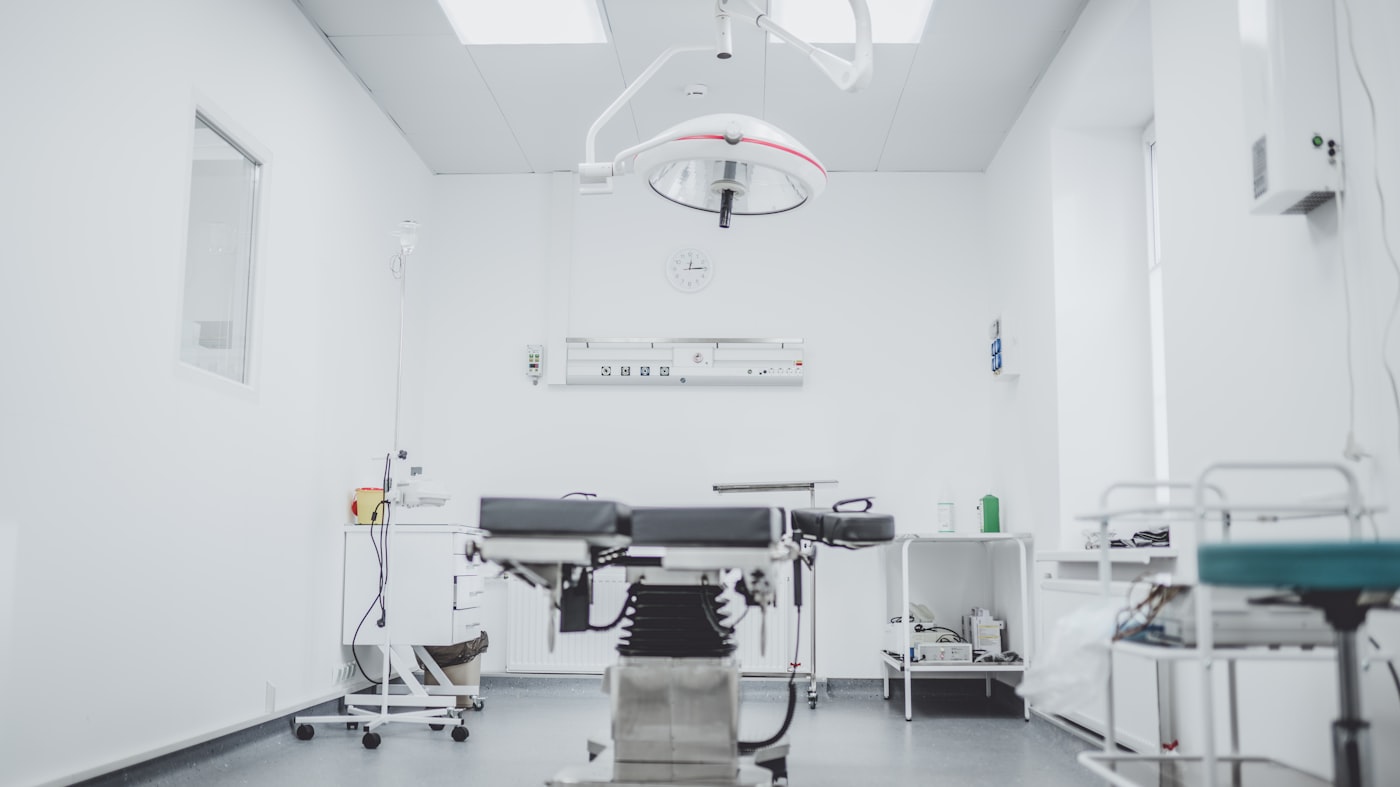 Private clinic treatment room representing private healthcare partners